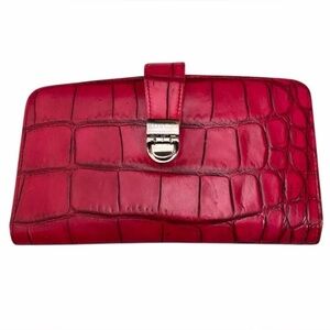 Bosca women’s croc embossed leather bifold wallet